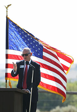 Tim Sheppard welcomes attendees to the ceremony